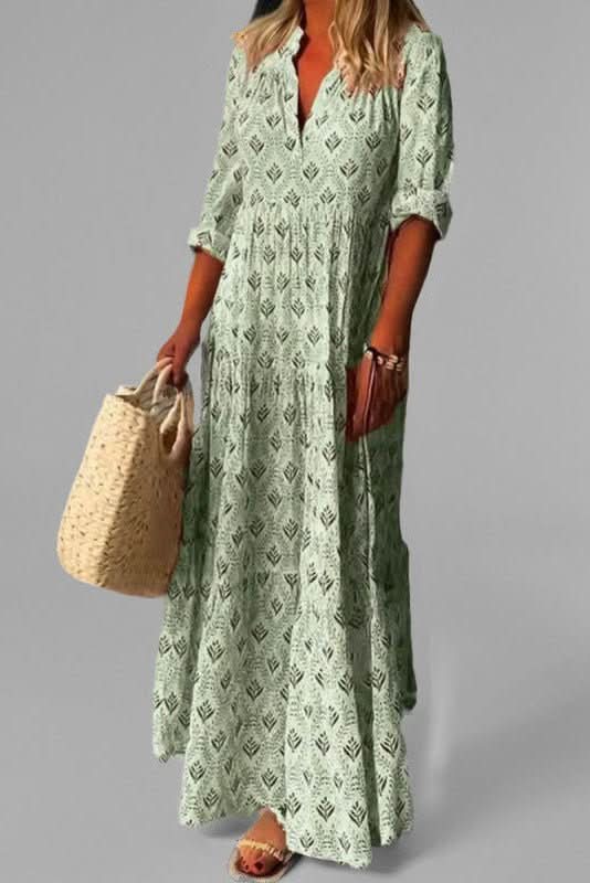 Women's elegant tiered maxi dress. Graceful flowing design in blue, perfect for summer casual occasions.