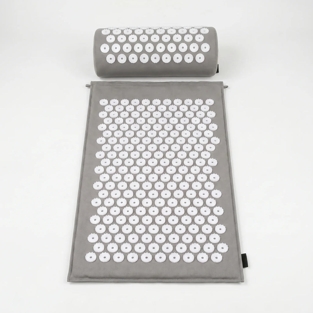 Unisex acupressure massage mat & pillow set for stress relief, muscle relaxation, and overall health.