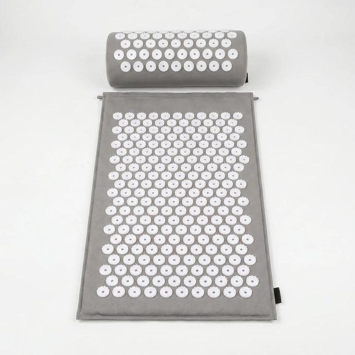 Unisex acupressure massage mat & pillow set for stress relief, muscle relaxation, and overall health.