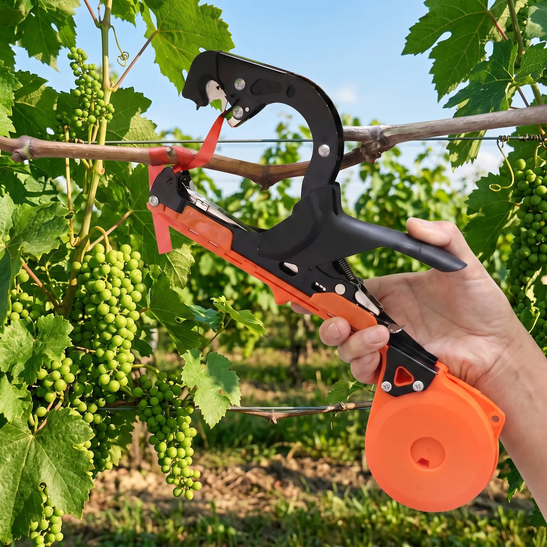 Green manual garden plant tying tool for trellising vines & vegetables, a handheld essential for plant care.