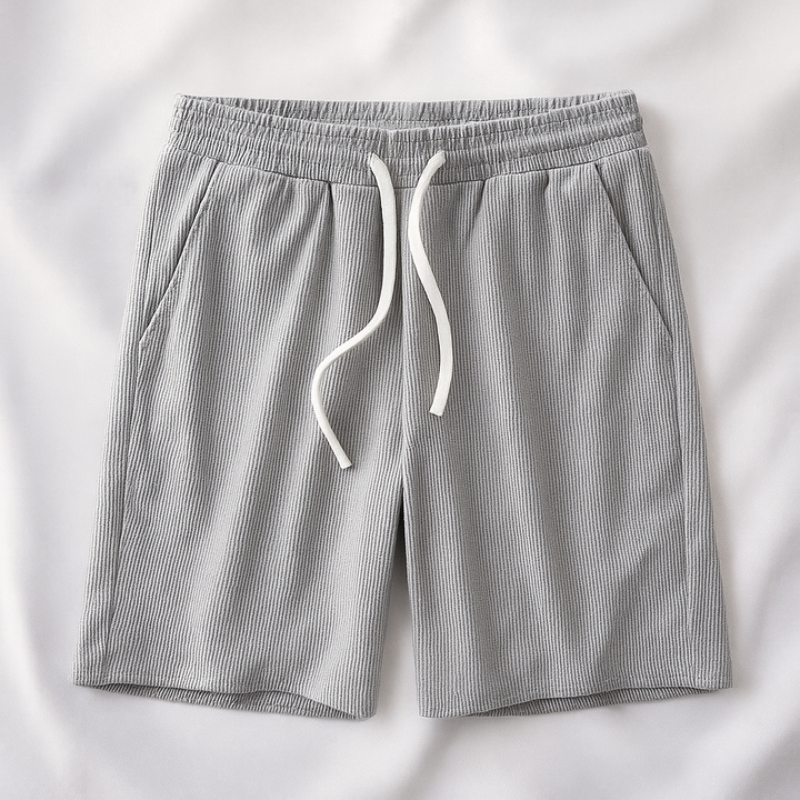 Black unisex relaxed comfort drawstring shorts, essential for casual wear, loungewear, or active summer days.