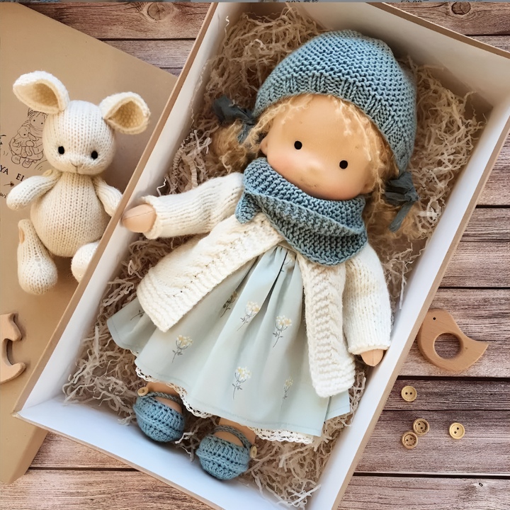 Kids' ethical Waldorf doll, a handmade heirloom cloth toy for creative play.