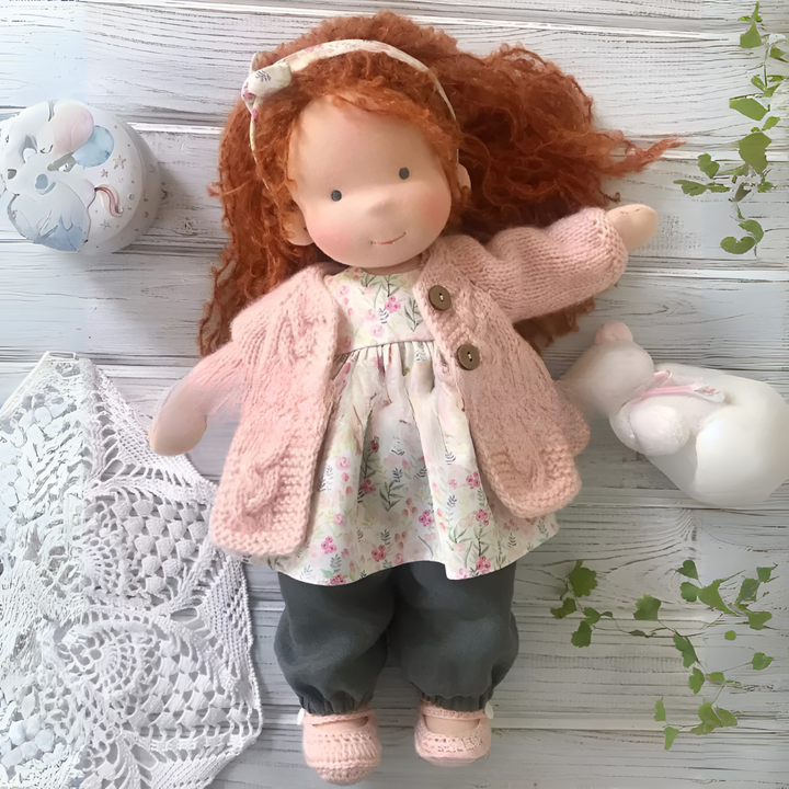 Soft organic Waldorf doll, a handmade cloth friend for children's adventures.