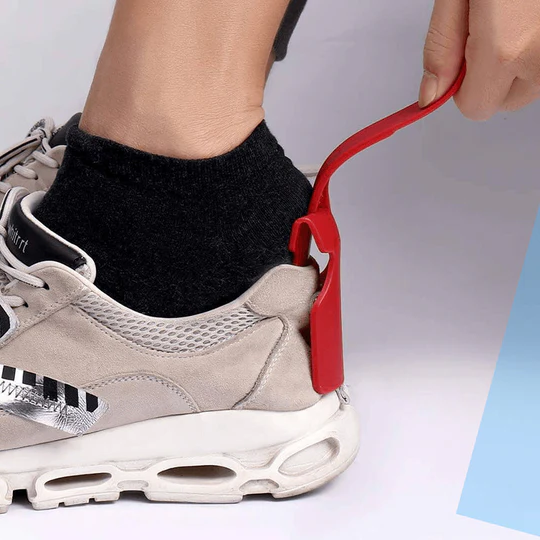 Hands-free easy shoe horn clip, universal design for convenient footwear application. Ideal mobility aid for elderly.