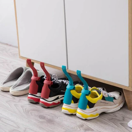 Clip-on shoe horn for hands-free convenience. A universal footwear accessory, making shoe care easy for all users.