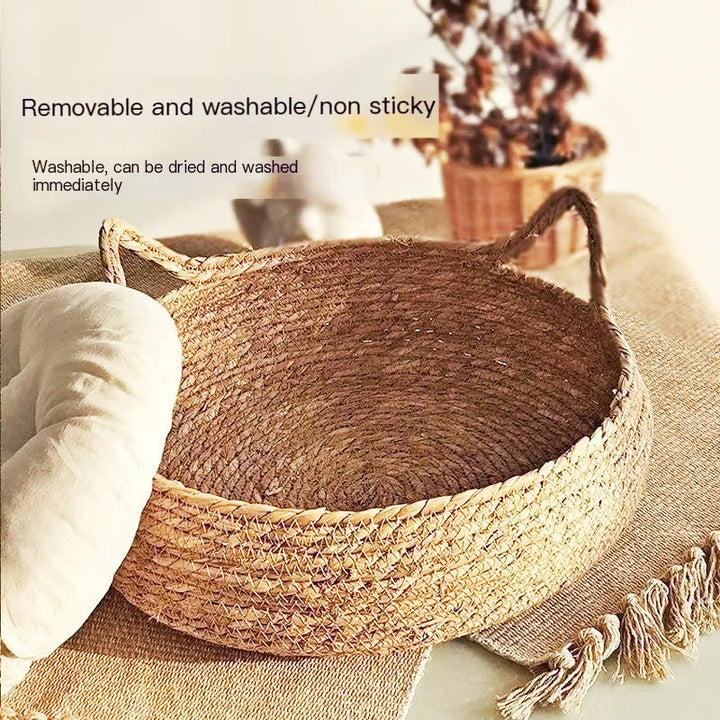 Elegant handwoven rattan pet basket for cats. Natural material, providing a cozy and secure cat bed.