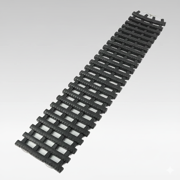 Heavy-duty car traction mat for off-road recovery, enhancing tire grip in snow, sand, or mud.