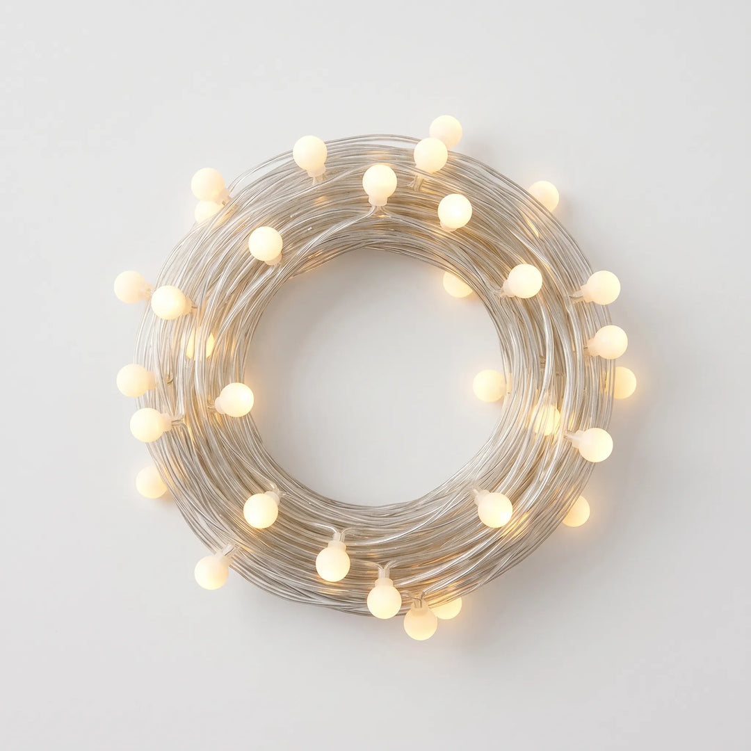 Bright LED globe string lights for indoor & outdoor ambiance. Battery/USB powered decorative fairy lights.