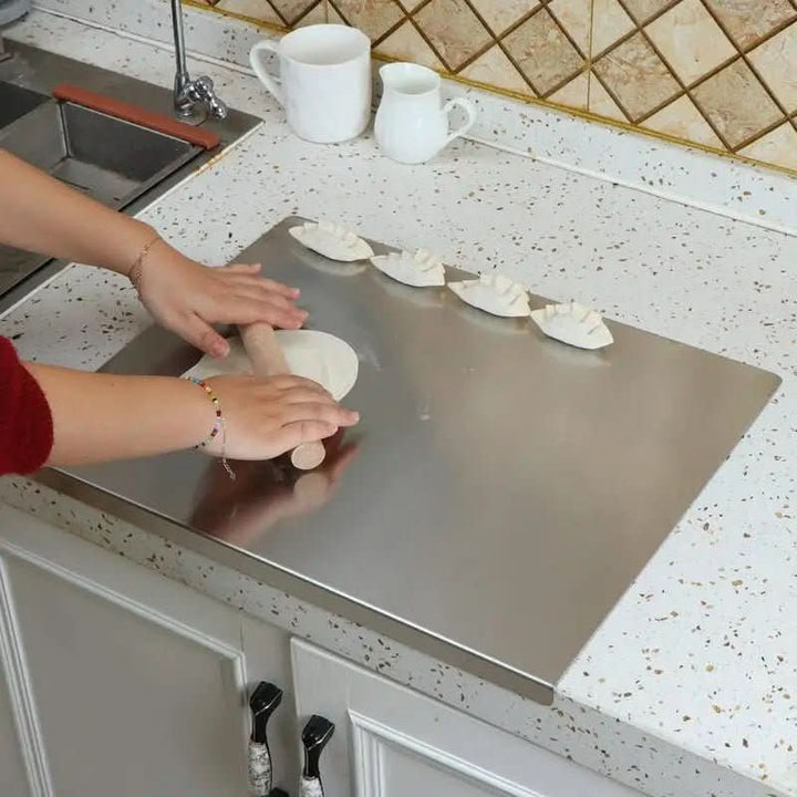 Durable stainless steel cutting board for hygienic food prep. Features non-slip grip & spill-proof design for safe use.