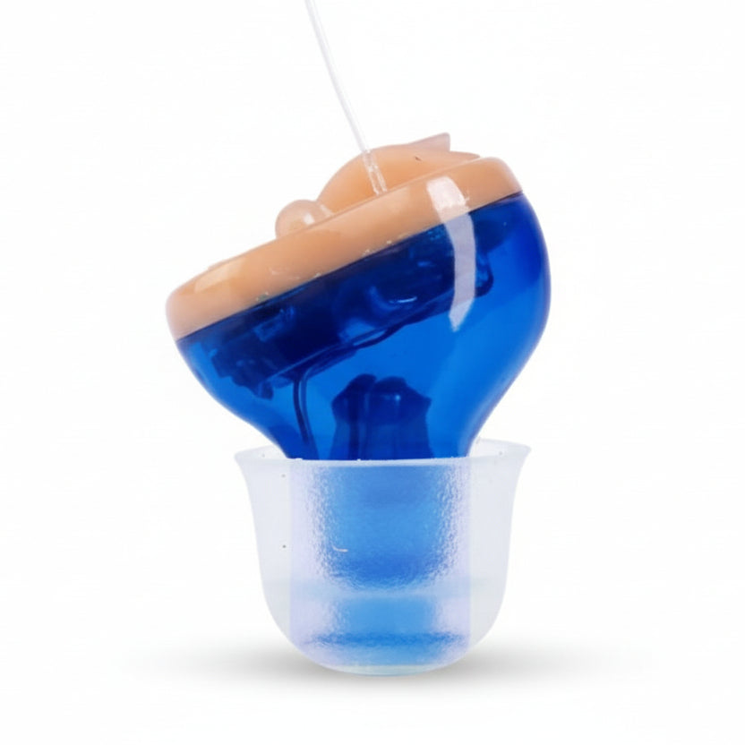 Ultra-compact invisible in-ear hearing aid, boosting sound with a discreet design.