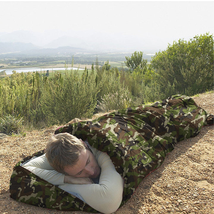Compact jungle camo sleeping bag, cold weather rated, essential gear for winter camping