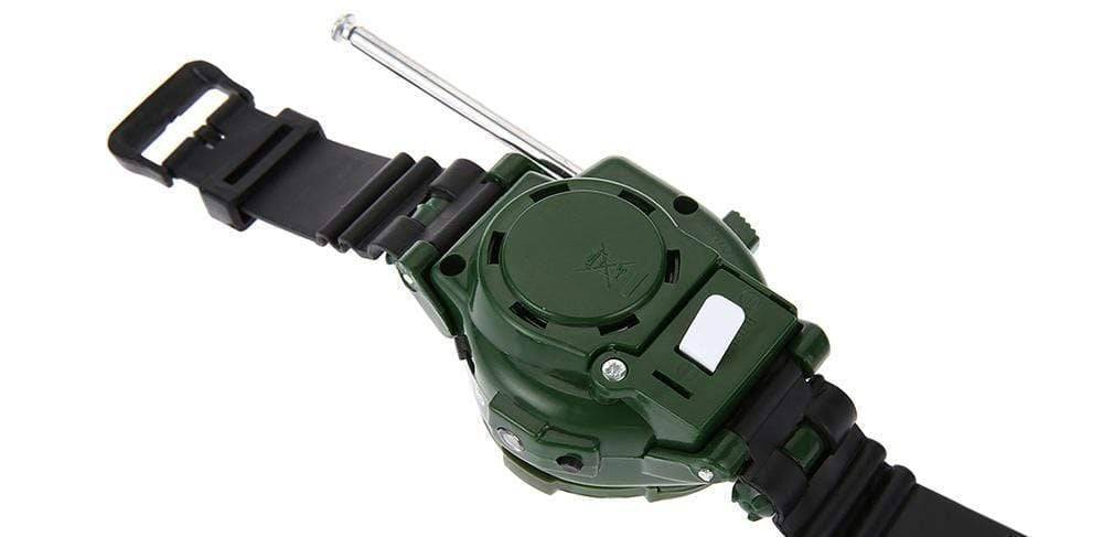 Outdoor scene with a child using a camouflage walkie talkie watch, an engaging survival toy.
