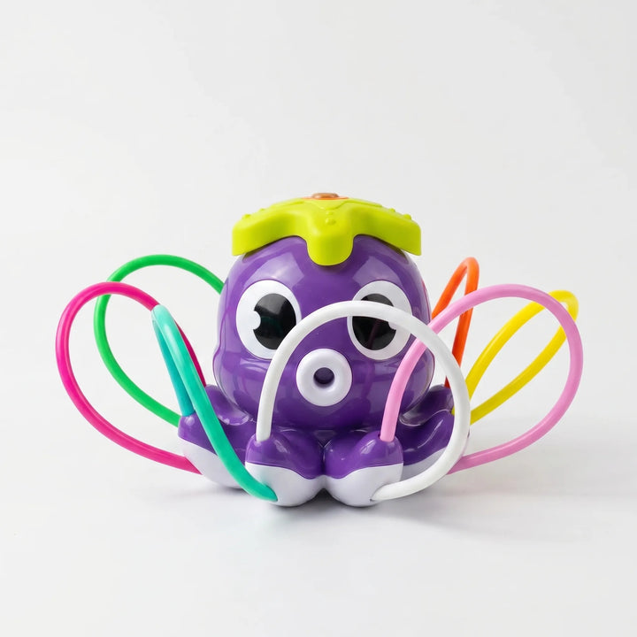 Energetic octopus water sprinkler creating a joyful spray, perfect for kids' active outdoor play & summer backyard parties.