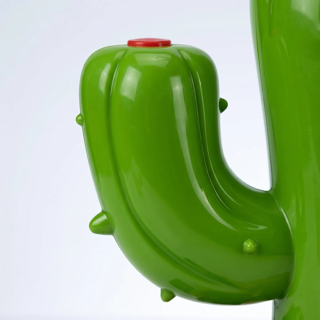 Colorful rotating cactus sprinkler providing endless outdoor water play and summer fun for kids.