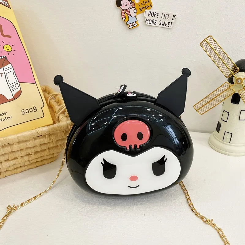 Compact Hello Kitty & Kuromi kids' hardshell carry-on suitcase with interior travel organizer bag.
