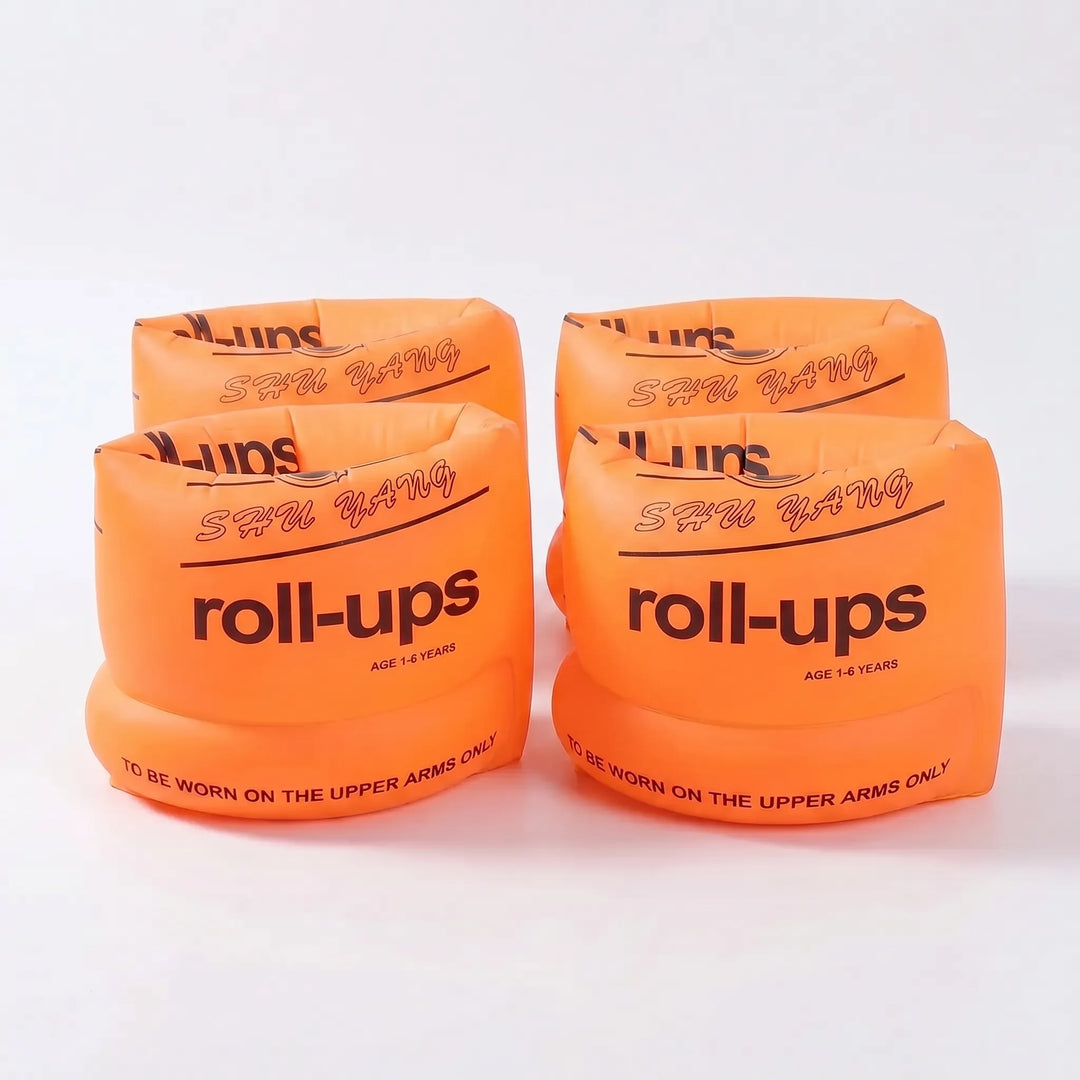 Easy-to-inflate armbands for kids, perfect for travel & summer water activities, promoting beginner swimming.