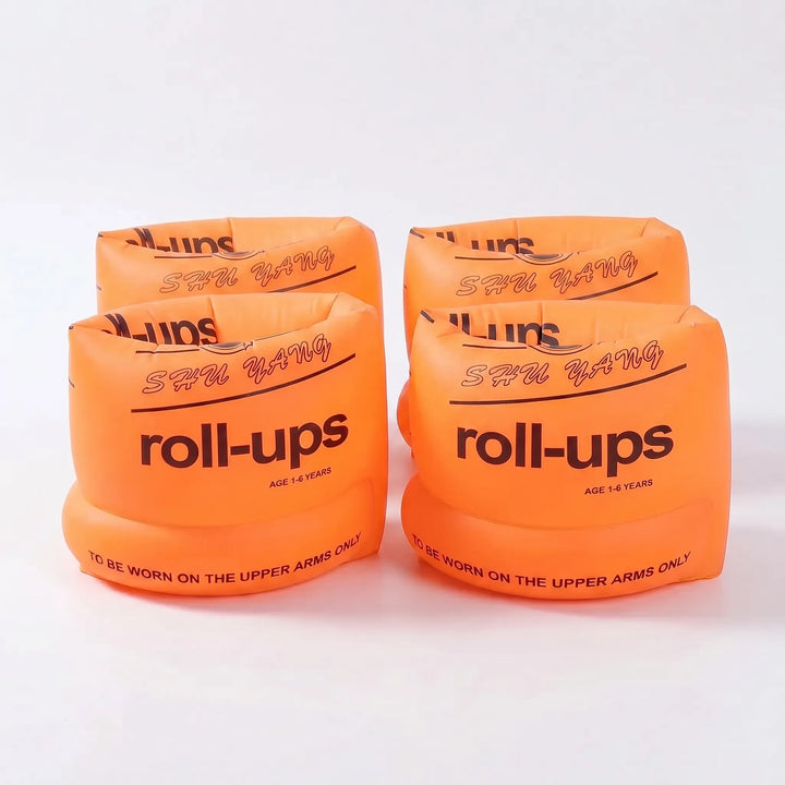 Easy-to-inflate armbands for kids, perfect for travel & summer water activities, promoting beginner swimming.