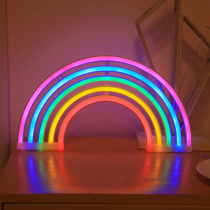 Modern neon rainbow table lamp featuring multi-color LEDs, a stylish decorative light for any child's bedroom.