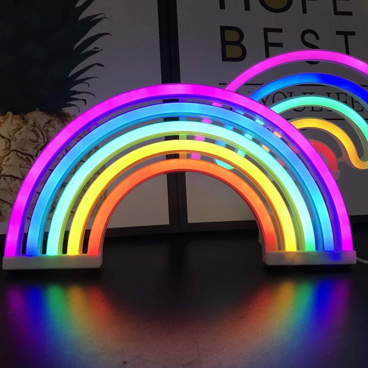 Unique neon rainbow table lamp, a charming gift for kids, enhancing home ambiance with its soothing, colorful glow.