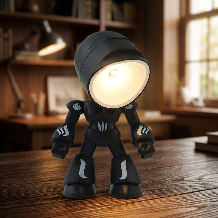 Kids' robot bedside night light, a compact LED reading lamp for children's rooms and nursery decor.