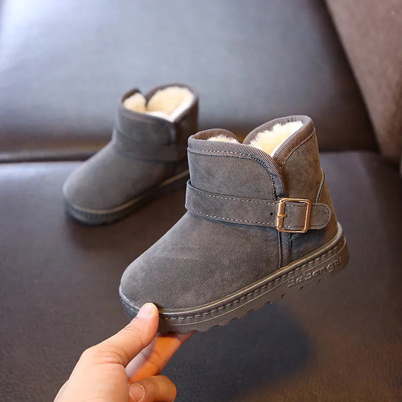 Warm & durable kids winter boots, ideal for boys and girls playing in snow. Comfortable cold weather footwear.