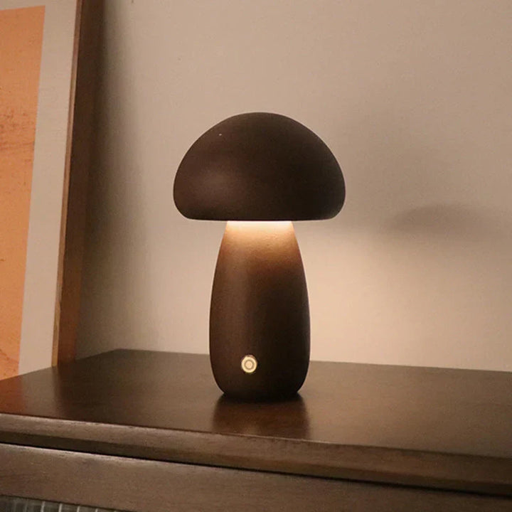 Eco-friendly wooden mushroom LED night light, GlowShroom, enhances any children's room with its warm glow.
