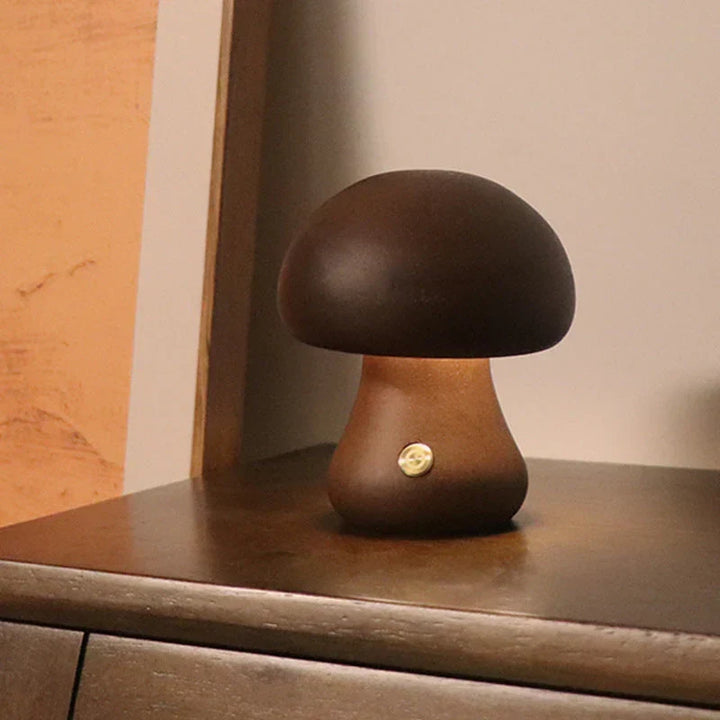 Charming wooden mushroom lamp, GlowShroom, an LED night light ideal for a child's bedside or room decor.