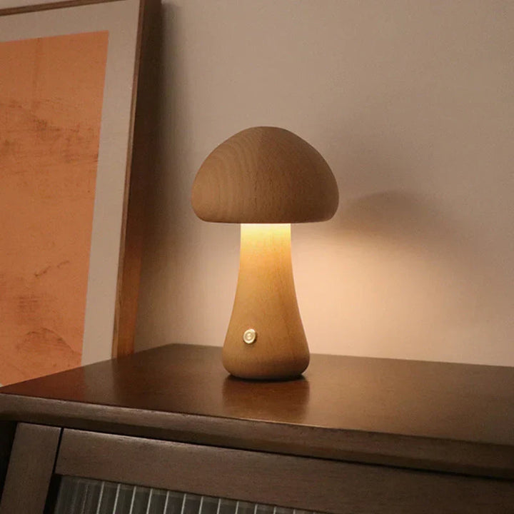 Safe and soothing GlowShroom wooden mushroom LED night light for children's rooms, with a warm, soft glow.