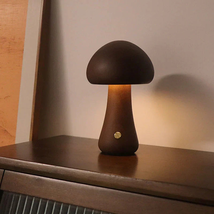 Cute GlowShroom wooden mushroom LED night light for kids' rooms, provides a gentle and warm light.