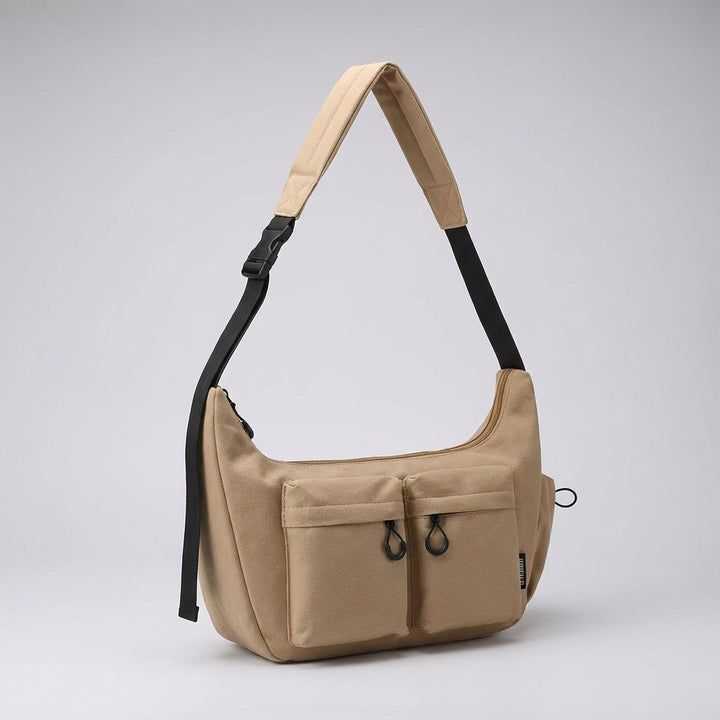 Durable large canvas crossbody bag for unisex use. Features multi-pockets & ample space for everyday essentials.