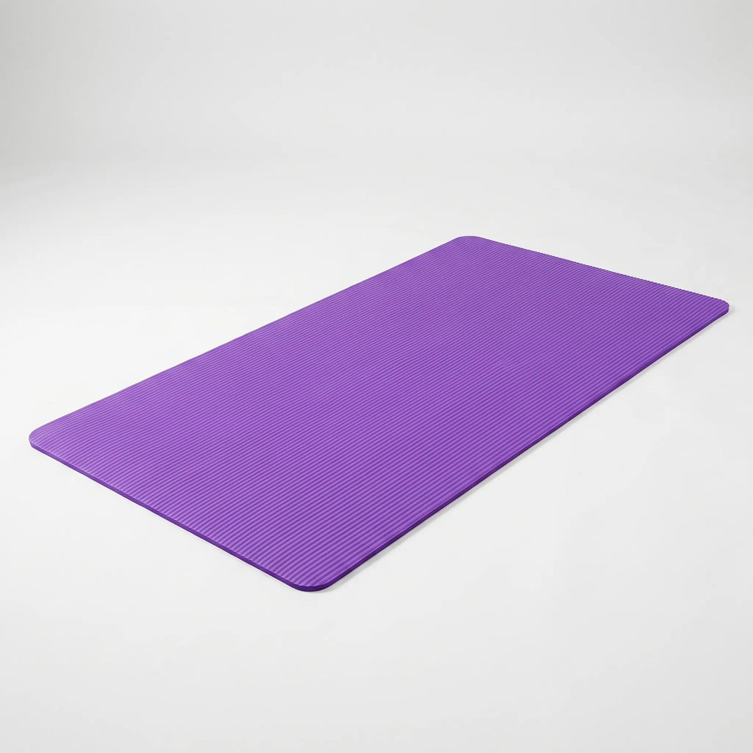 Thickened large fitness mat, non-slip for yoga, pilates & home gym workouts. Provides comfort & support.