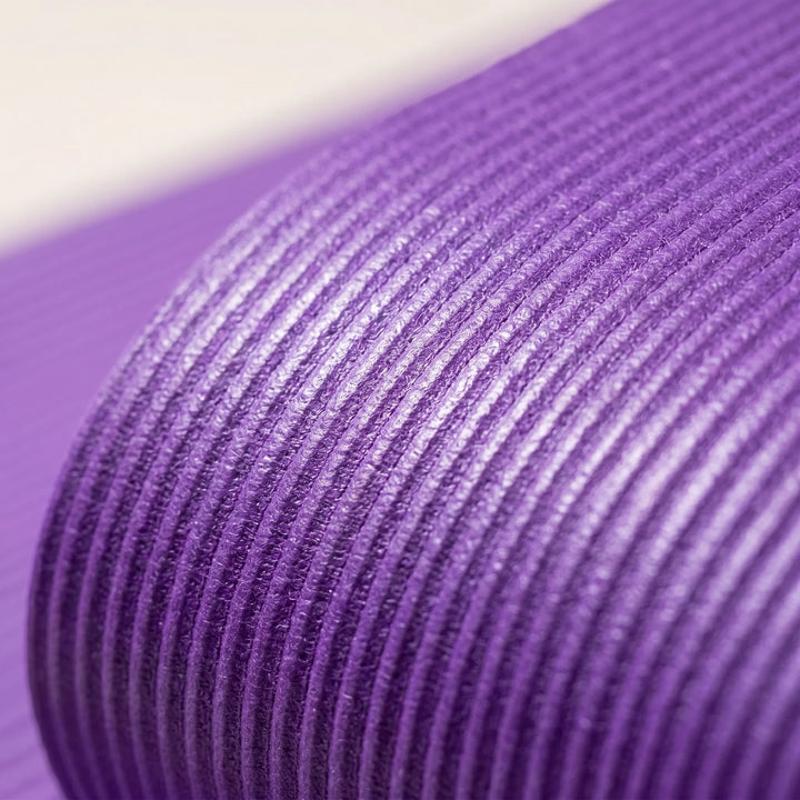 Comfortable, large, thick workout mat for home gym. Non-slip design for yoga, pilates, and floor exercises.
