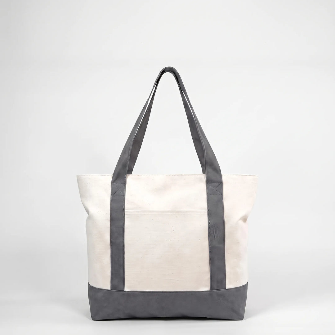 Spacious unisex tote bag with secure zipper, ideal for shopping, commuting, or travel.