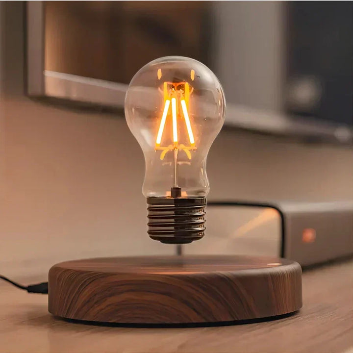 Unique LevitaLux levitating light bulb with elegant walnut wood base, perfect modern home decor & mood lighting.