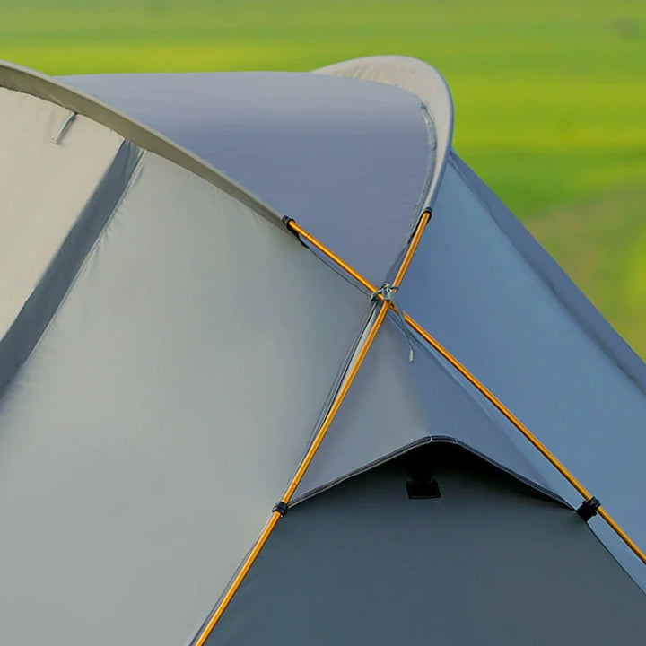 Backpacking tent for two people, designed for easy setup, lightweight and durable for hiking.