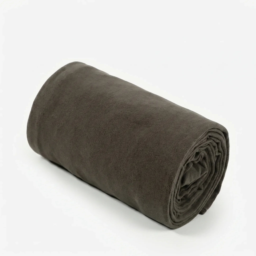 Outdoor enthusiasts' lightweight fleece sleeping bag liner. Essential travel gear for backpacking, camping, and hiking.