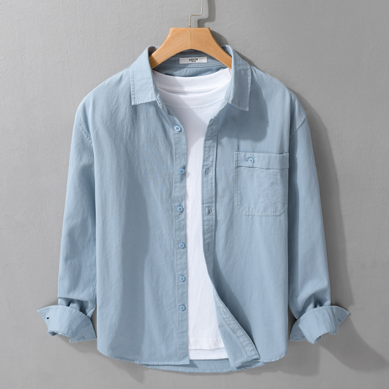 Man in a lightweight long sleeve button-up shirt, perfect smart casual top for office or weekend adventures.