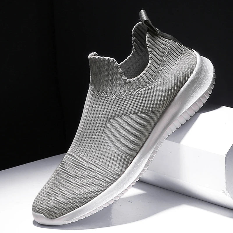Lightweight men's knit running sneakers, engineered for all-day comfort and athletic performance.