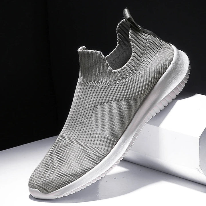 Lightweight men's knit running sneakers, engineered for all-day comfort and athletic performance.