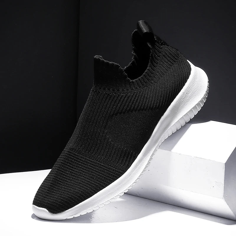 Men's breathable knit running shoes, perfect for walking, gym, and casual wear. Slip-on design.