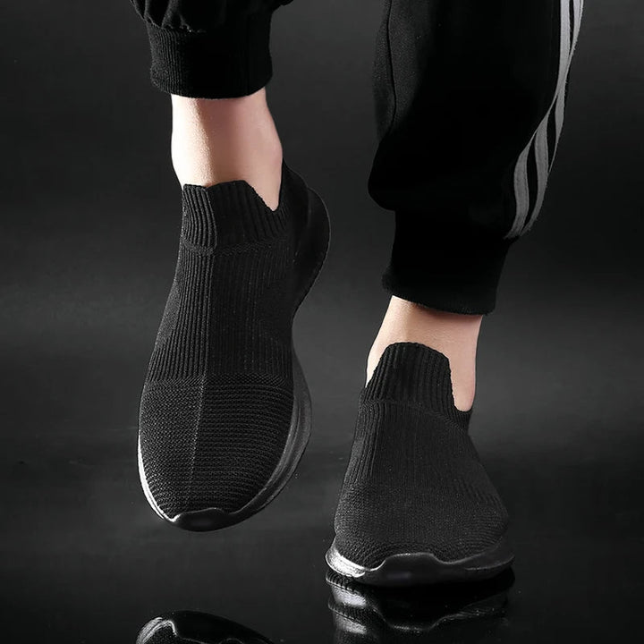 Versatile men's athletic knit sneakers, designed for all-day comfort, running, walking, and gym activities.