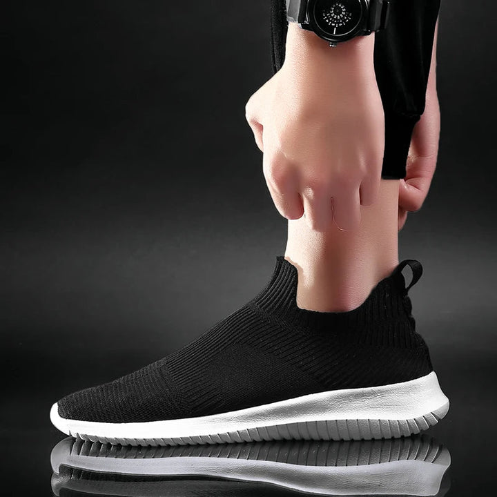 Stylish men's lightweight knit running sneakers, providing superior comfort and breathability for active lifestyles.