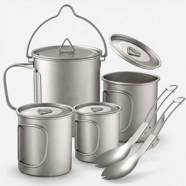 Lightweight titanium camping cookware set with pot, pan, & lid, perfect for backpacking & outdoor cooking.