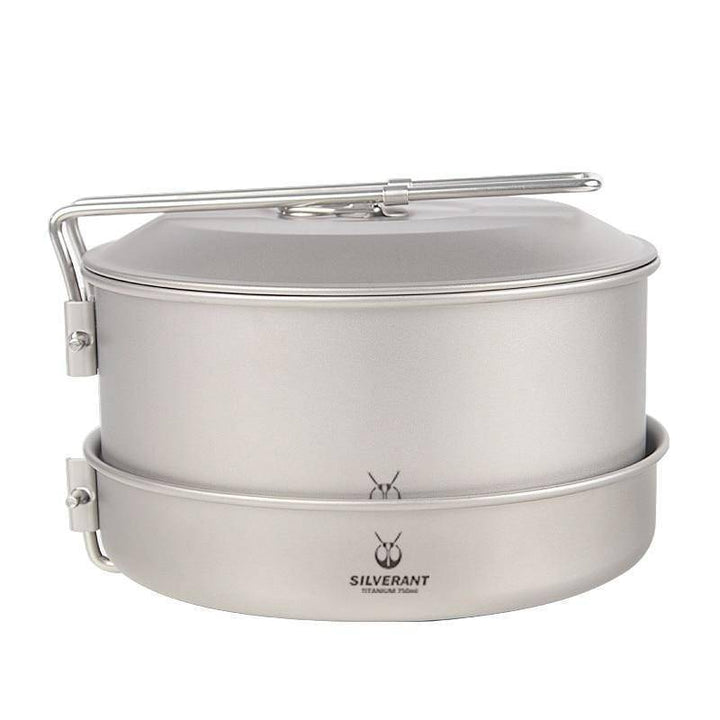 Compact outdoor cooking set including titanium pot and pan, ideal for camping