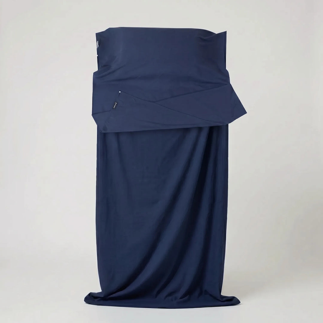 Practical unisex travel sleeping bag liner, essential for camping, hostels, and clean sleeping on the go.