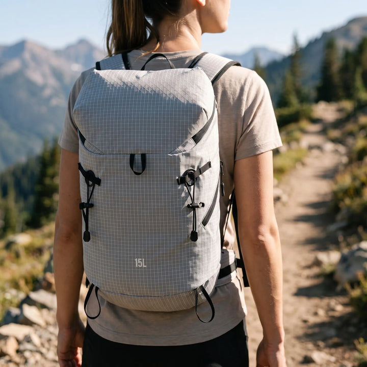 Lightweight unisex hiking hydration pack, perfect for trails, camping, & outdoor adventures.