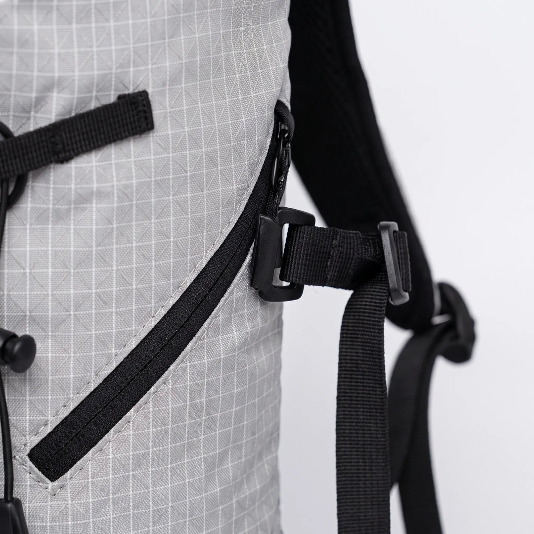 Ergonomic lightweight hiking pack with water bladder pocket, ideal for trail adventures & comfort.