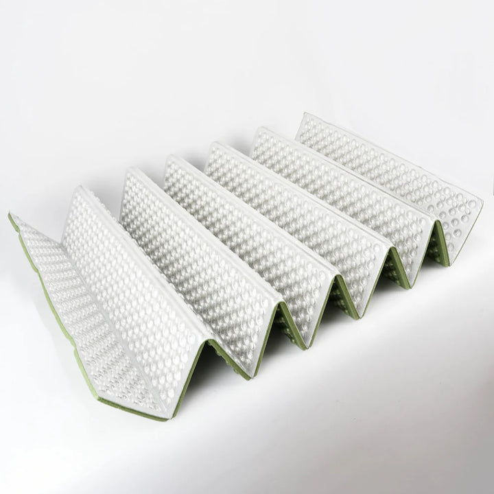 Compact sleeping pad, ideal outdoor gear for hikers & travelers seeking warmth & portability