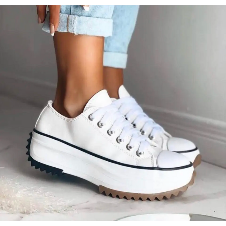 Stylish women's lightweight sneakers. Comfortable footwear with arch support, perfect for active fashion.