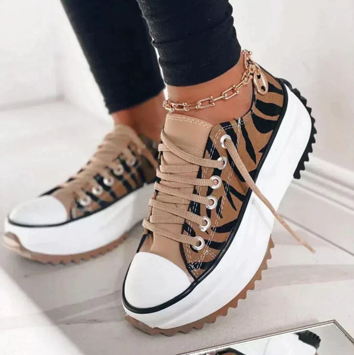 Ultimate comfort women's sneakers. Lightweight, breathable athletic shoes providing foot support for active days.